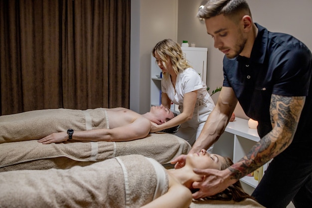 beautiful young woman relaxing with her partner traditional thai massage luxury spa wellness center 130265 6924